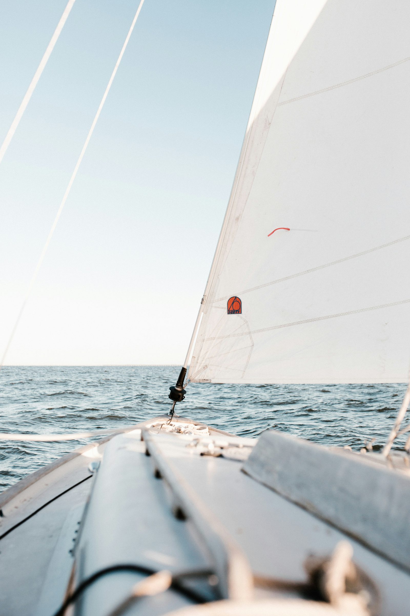 A sailing yacht under way offshore, heeling to the breeze